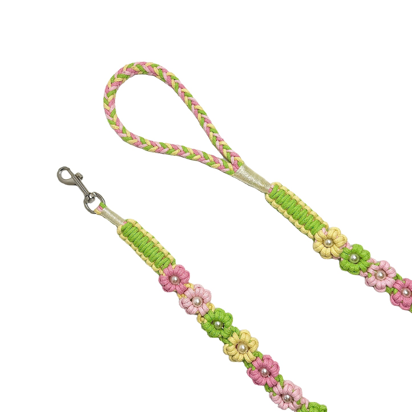 The soft handle and the clip of the handmade bright spring dog leash, featuring multiple beautiful woven flowers.