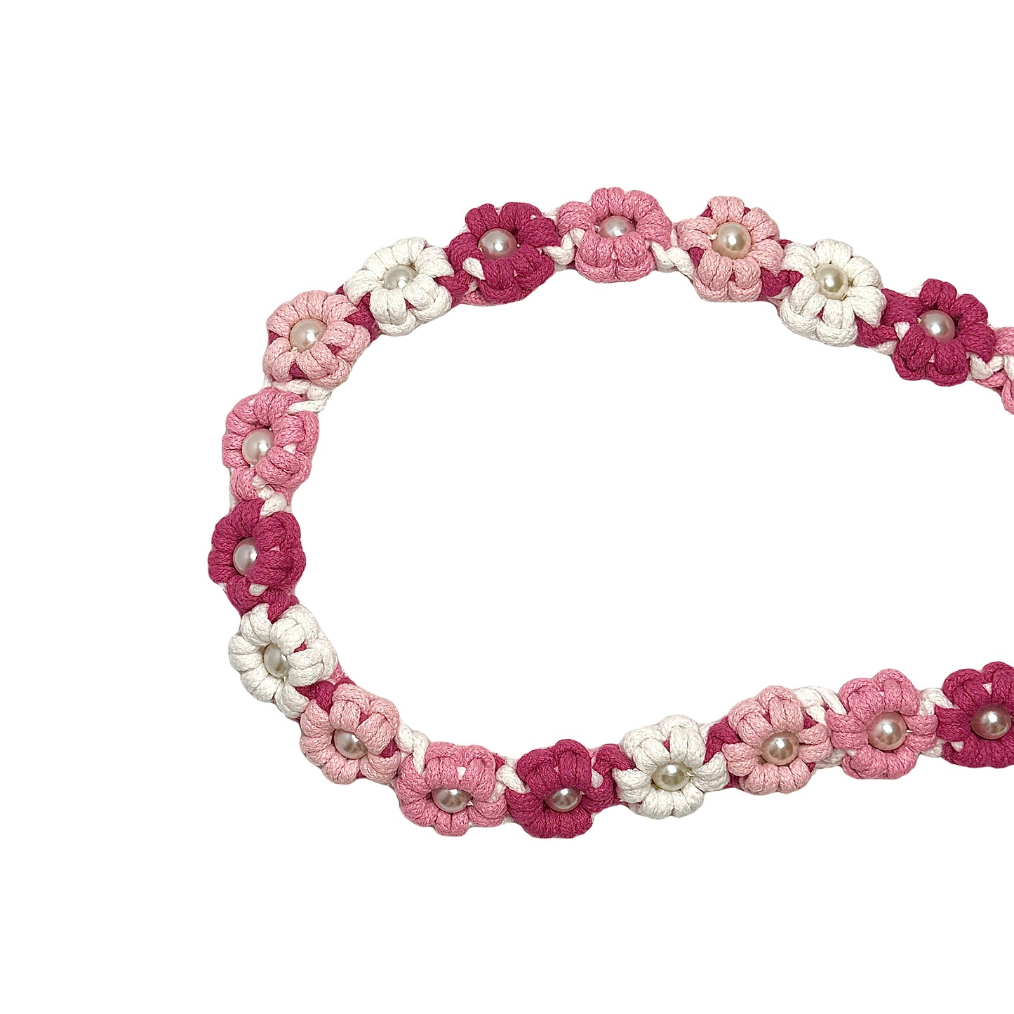 Dog leash decorated with numerous handcrafted flowers in stylish pink and red tones.