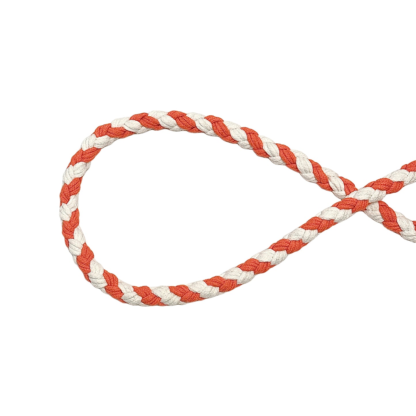 A close-up of a handwoven orange and white braided rope, crafted from soft cotton material, this rope features a twisted design, creating a durable and stylish pattern.