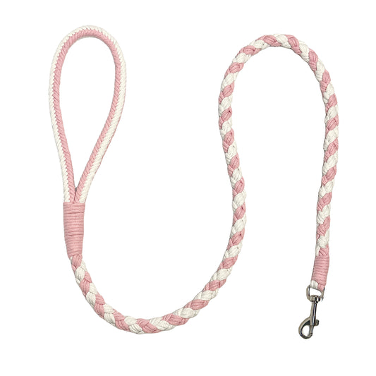 A pink and white handmade dog leash crafted from braided cotton with a soft handle and a secure metal clip, perfect for everyday use.