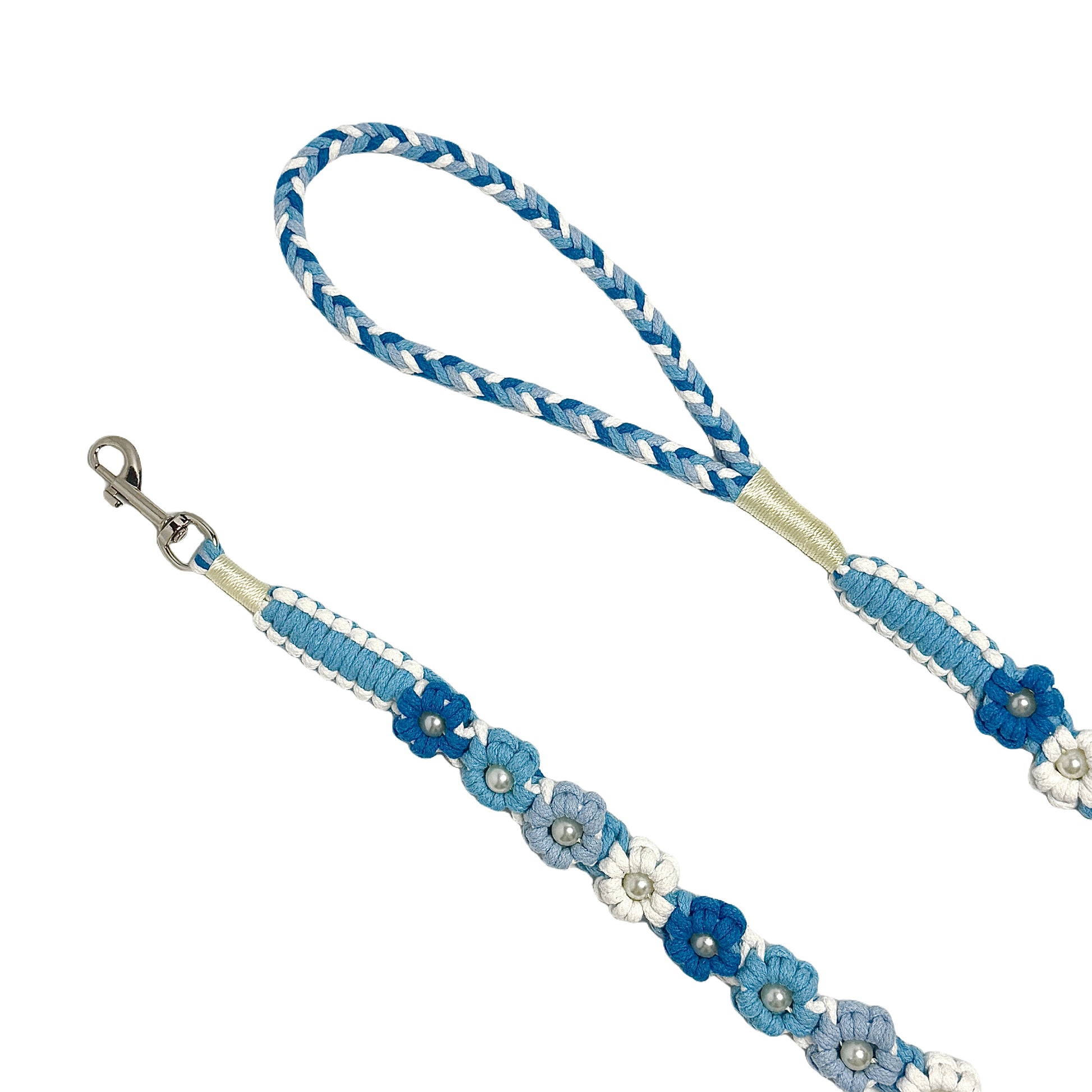 The soft handle and the clip of the handmade gradient blue dog leash, featuring multiple beautiful woven flowers.