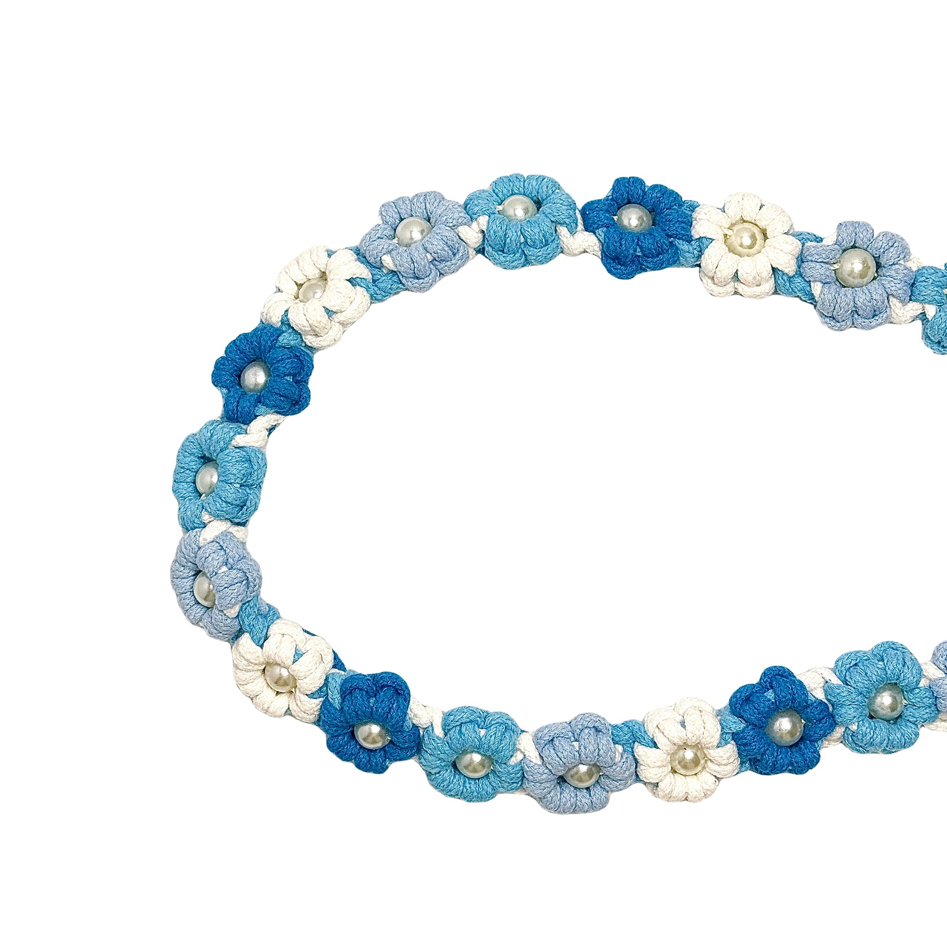 Dog leash decorated with numerous handcrafted flowers in serene blue and gray tones.