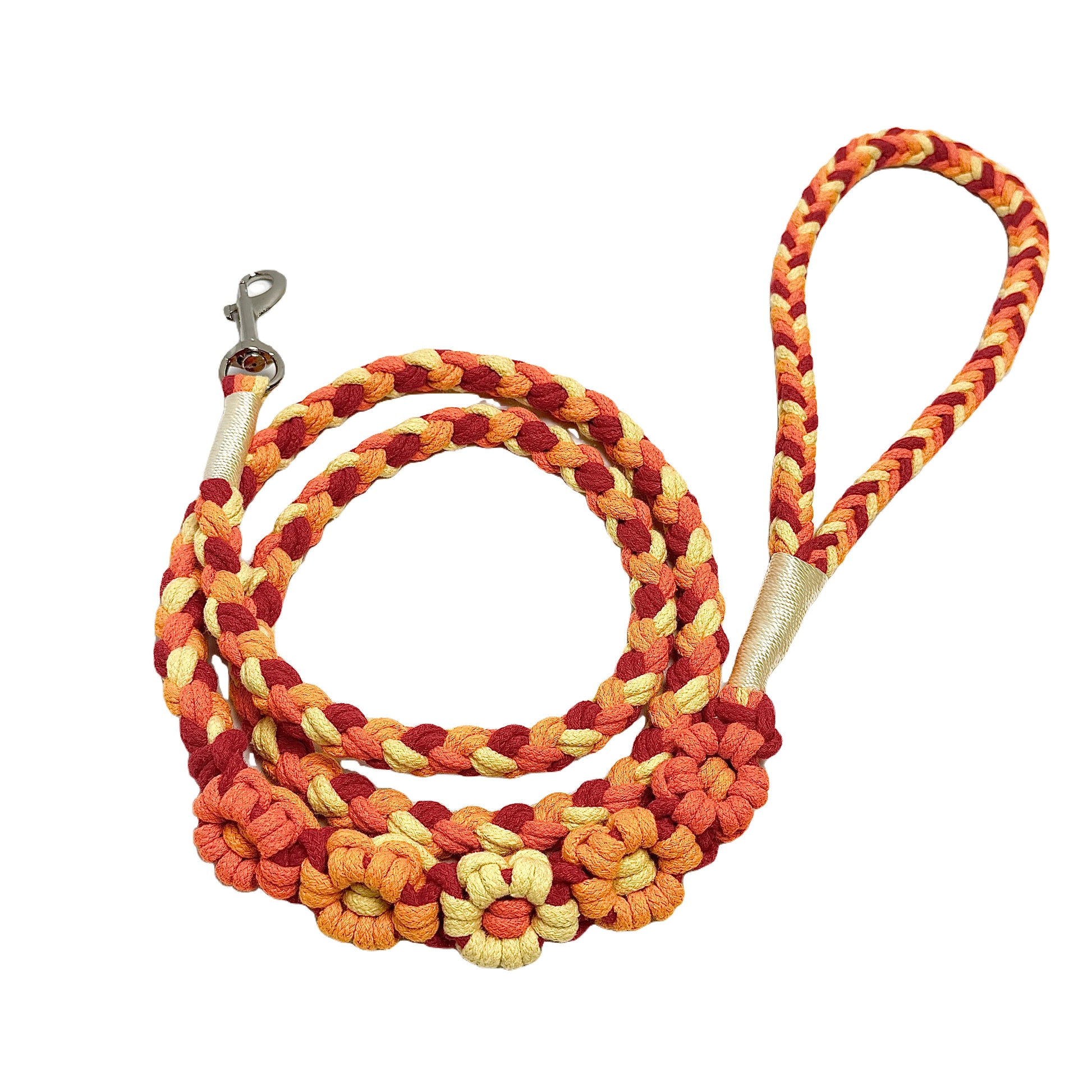 Orange and yellow five-flower handmade dog leash coiled together, displaying its overall design with a lively and passionate look.